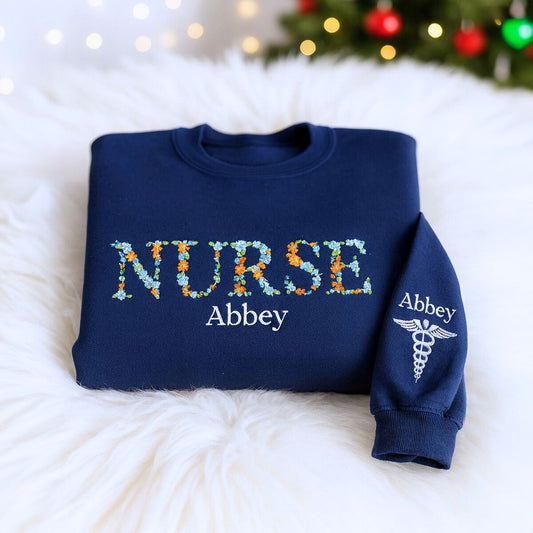 Personalized nurse sweatshirt with floral embroidery and name on chest – ideal Christmas gift for nurses