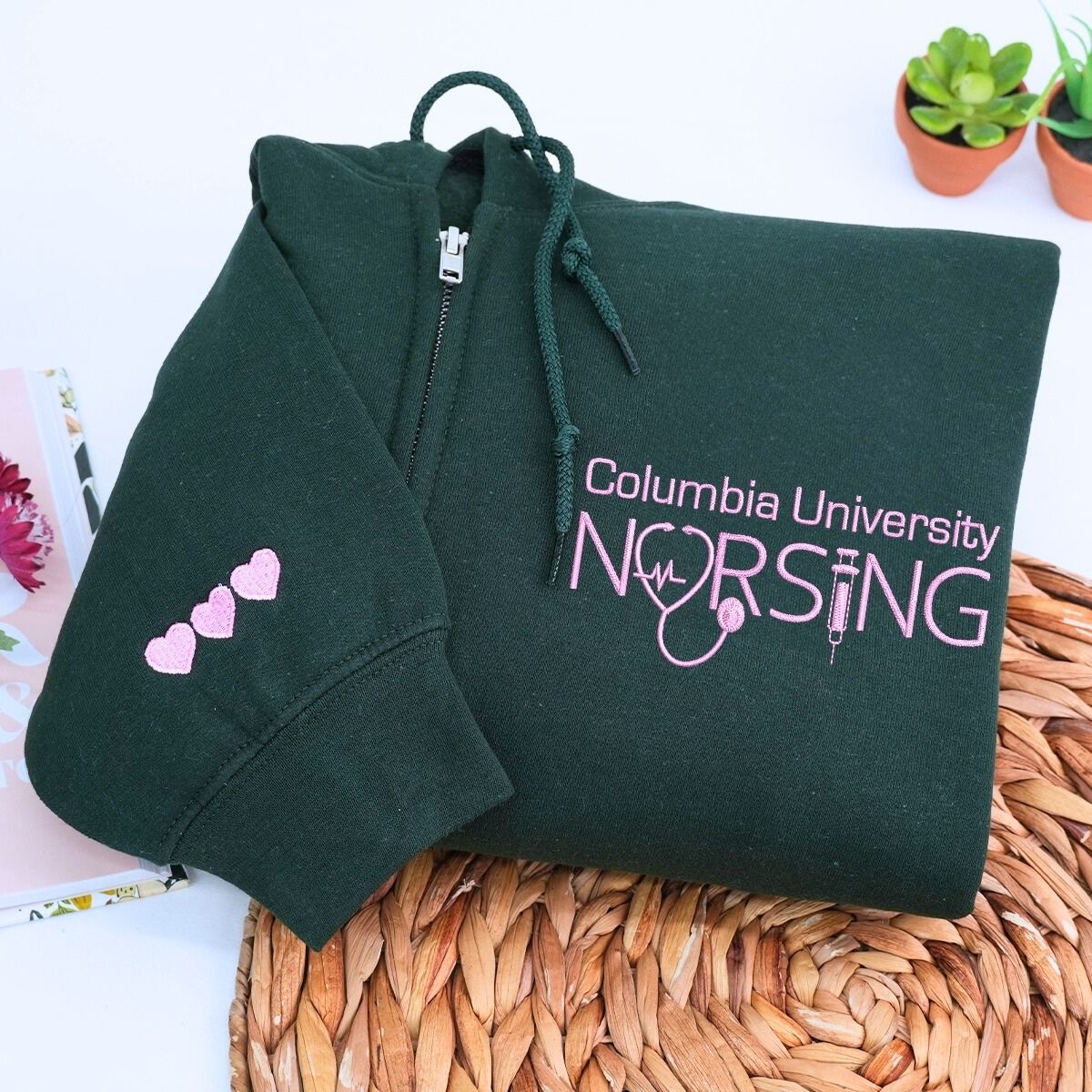 Custom embroidered nurse quarter zip sweatshirt with university name and personalized sleeve text