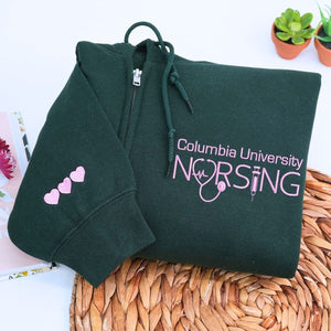 Custom embroidered nurse quarter zip sweatshirt with university name and personalized sleeve text