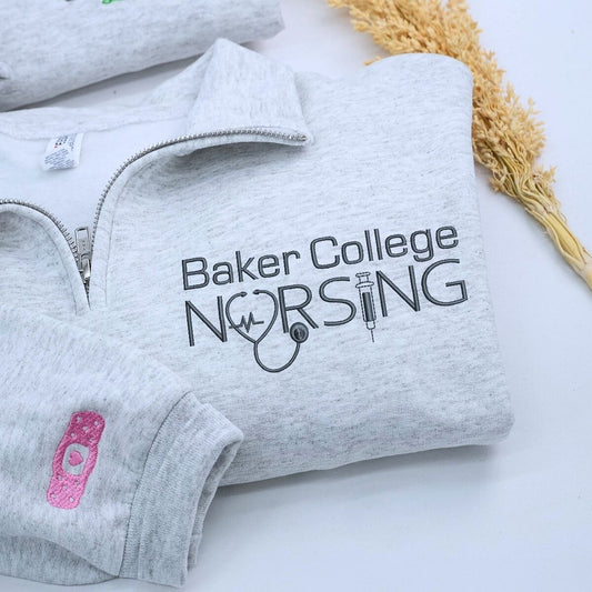 Custom embroidered nurse quarter zip sweatshirt with university name and personalized sleeve text