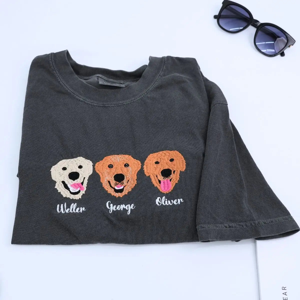 Custom white t-shirt with a embroidered cat dog face portrait, personalized from a customer photo