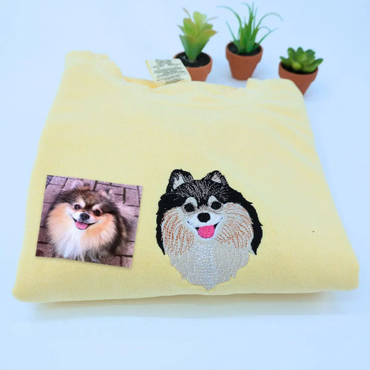 Custom embroidered shirt featuring Pomeranian portrait and name on sleeve