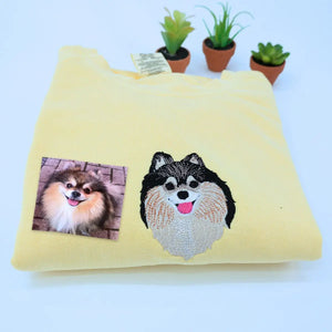 Custom embroidered shirt featuring Pomeranian portrait and name on sleeve