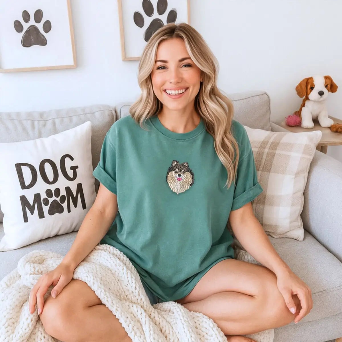 Custom embroidered shirt with realistic Pomeranian dog portrait and name stitched on sleeve