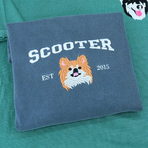 Custom embroidered shirt with realistic Pomeranian dog portrait and name stitched on sleeve