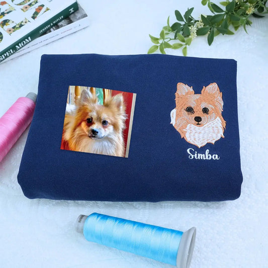Custom embroidered shirt with realistic Pomeranian dog portrait and name stitched on sleeve