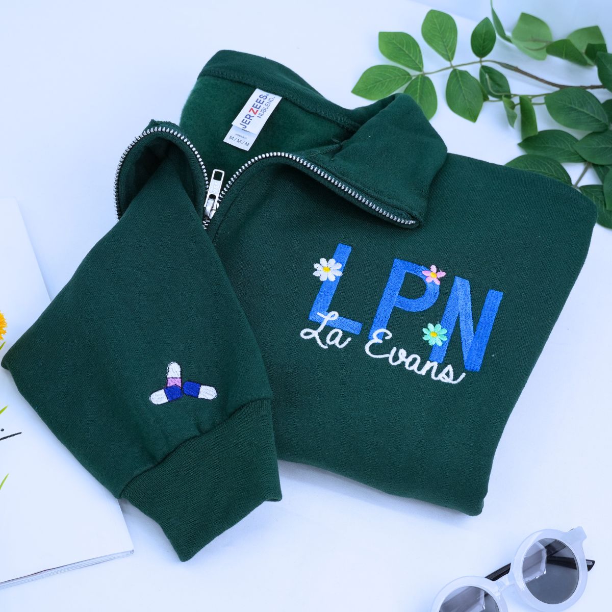 Embroidered RN sweatshirt with floral design and custom name, perfect personalized gift for nurses or nursing students