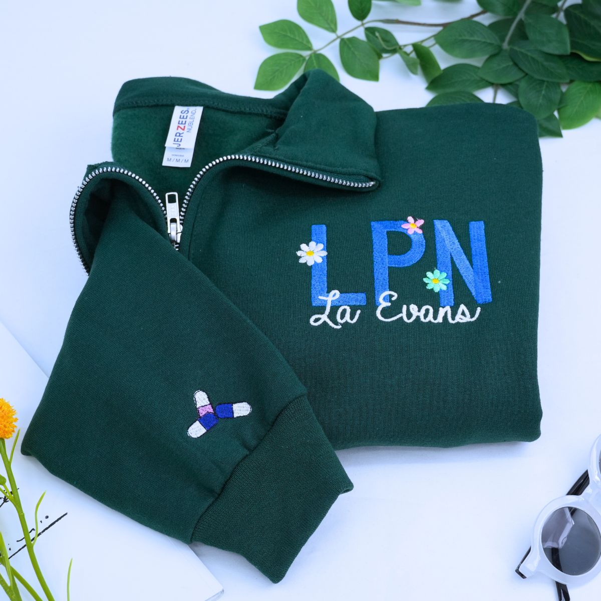 Embroidered RN sweatshirt with floral design and custom name, perfect personalized gift for nurses or nursing students