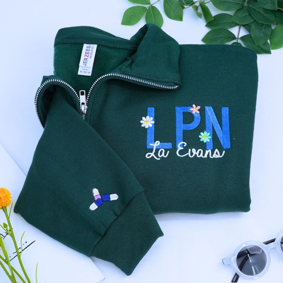 Embroidered RN sweatshirt with floral design and custom name, perfect personalized gift for nurses or nursing students