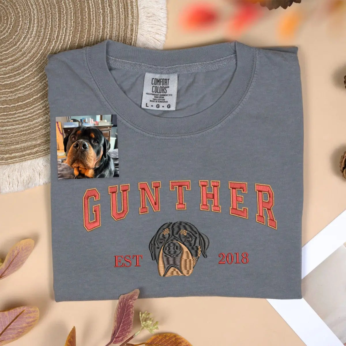 Custom embroidered shirt featuring a Rottweiler dog portrait and name on sleeve, ideal gift for dog dads or pet lovers.