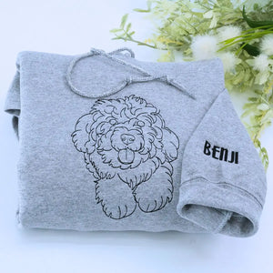Embroidered hoodie featuring custom Shih Tzu portrait and name on sleeve