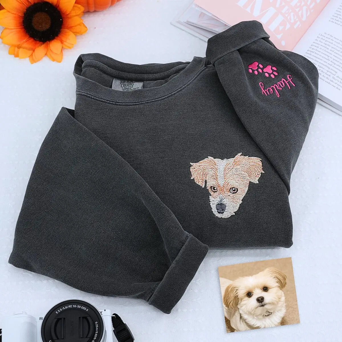 Embroidered sweatshirt featuring custom Shih Tzu portrait and name on sleeve
