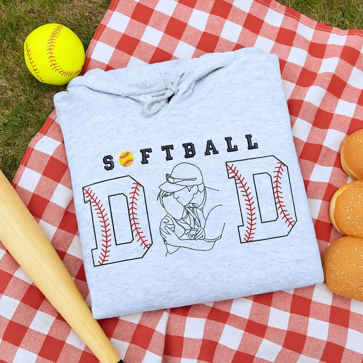 Custom embroidered hoodie for softball dad featuring stitched photo and kid's name on sleeve