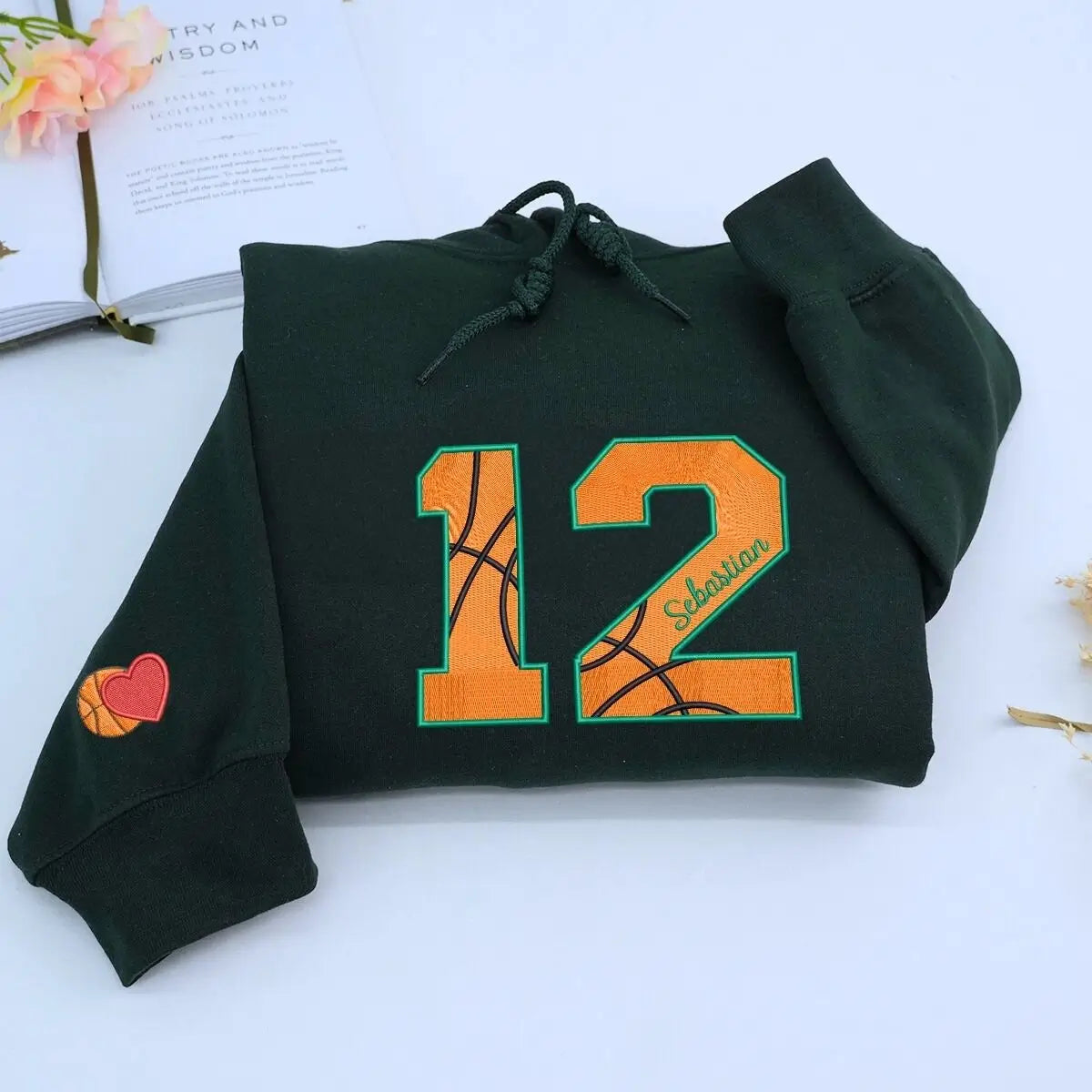 Custom embroidered sports hoodie with name and number, perfect personalized gift for fans, players, or proud parents.