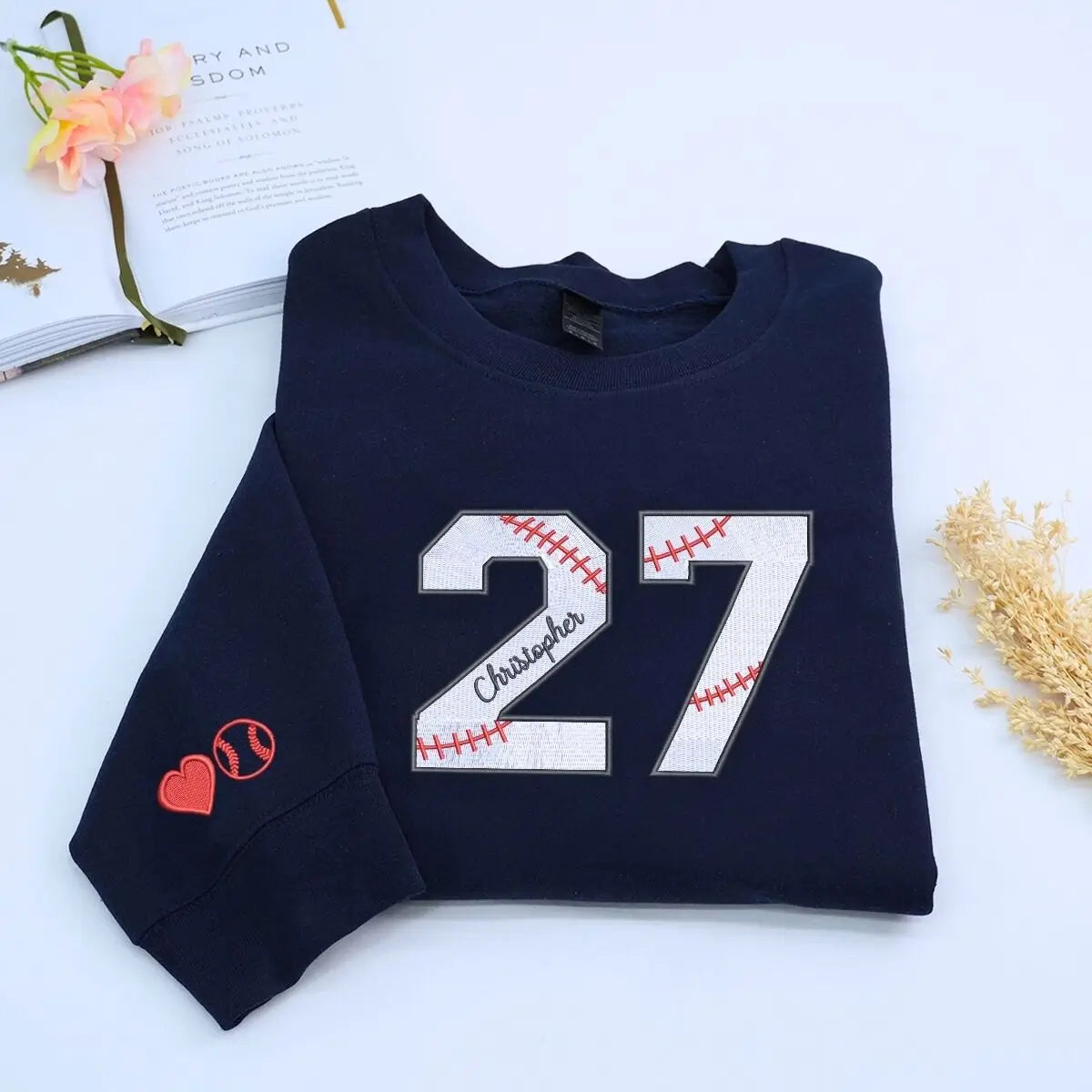 Custom embroidered sports hoodie with name and number, perfect personalized gift for fans, players, or proud parents.