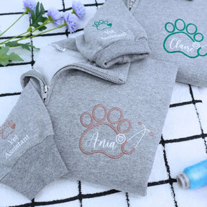 Custom embroidered quarter zip vet tech sweatshirt with personalized name and sleeve text