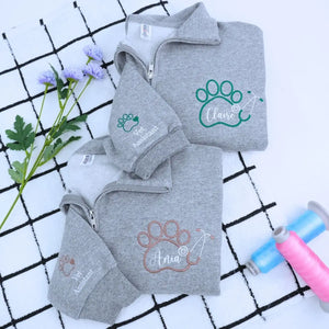 Custom embroidered quarter zip vet tech sweatshirt with personalized name and sleeve text