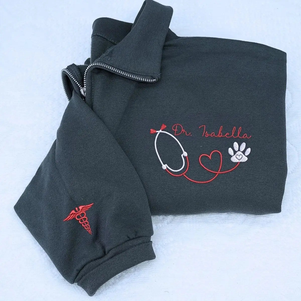 Custom embroidered vet tech quarter sweatshirt with name on chest and text on sleeve