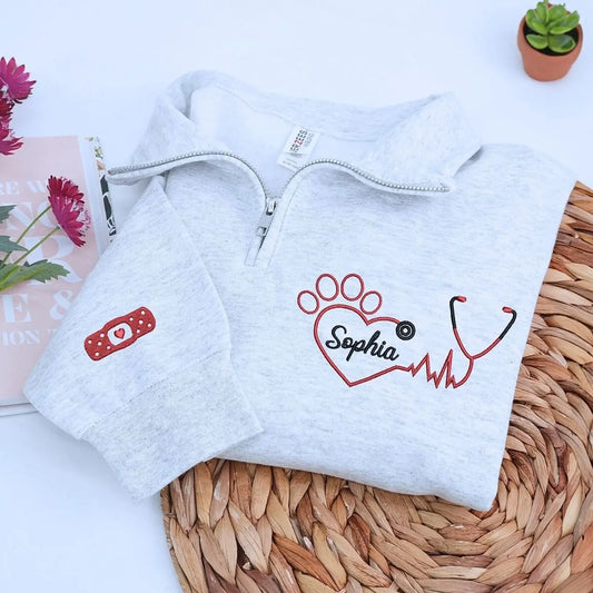 Embroidered veterinarian sweatshirt with custom name and sleeve text for vet nurses