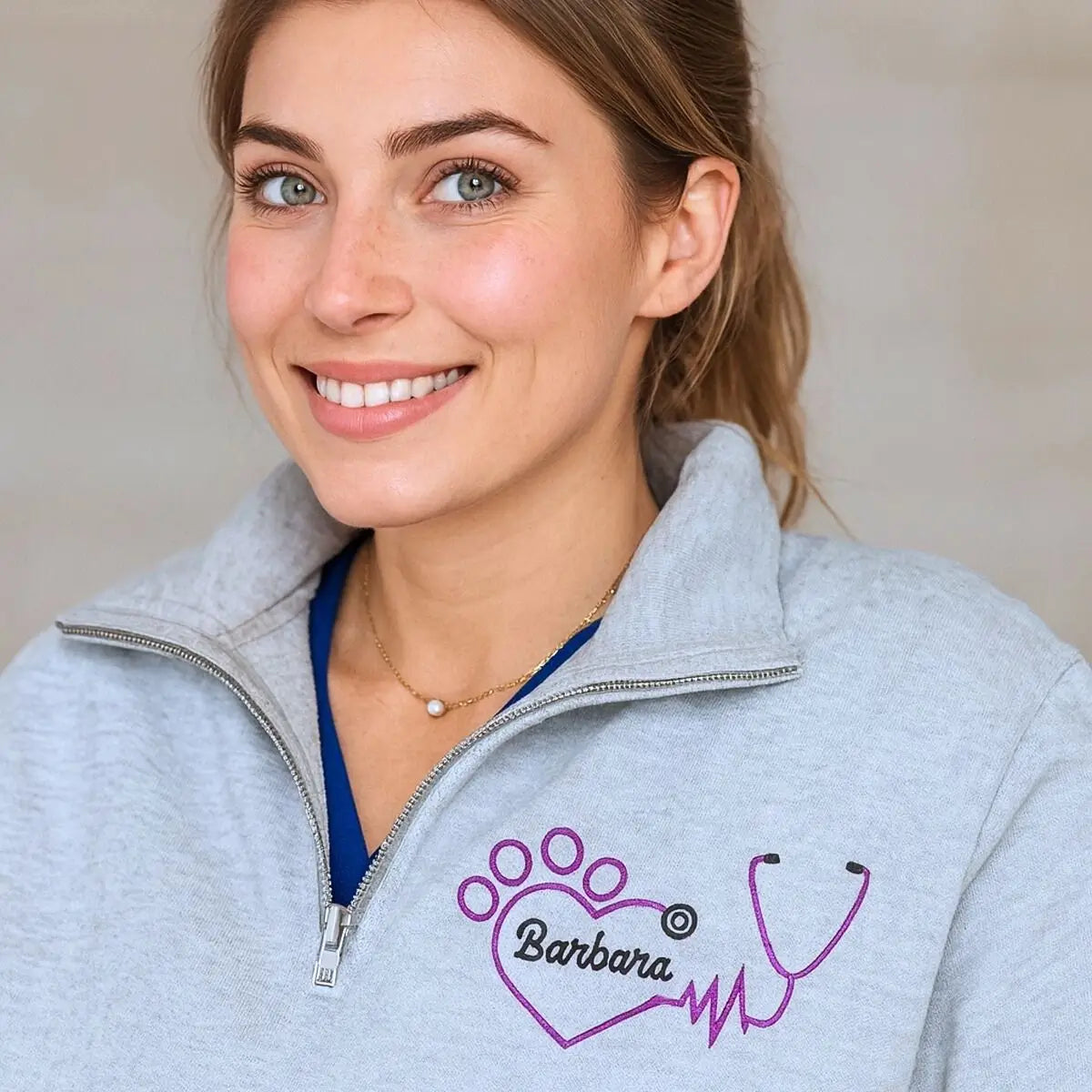 Embroidered veterinarian sweatshirt with custom name and sleeve text for vet nurses