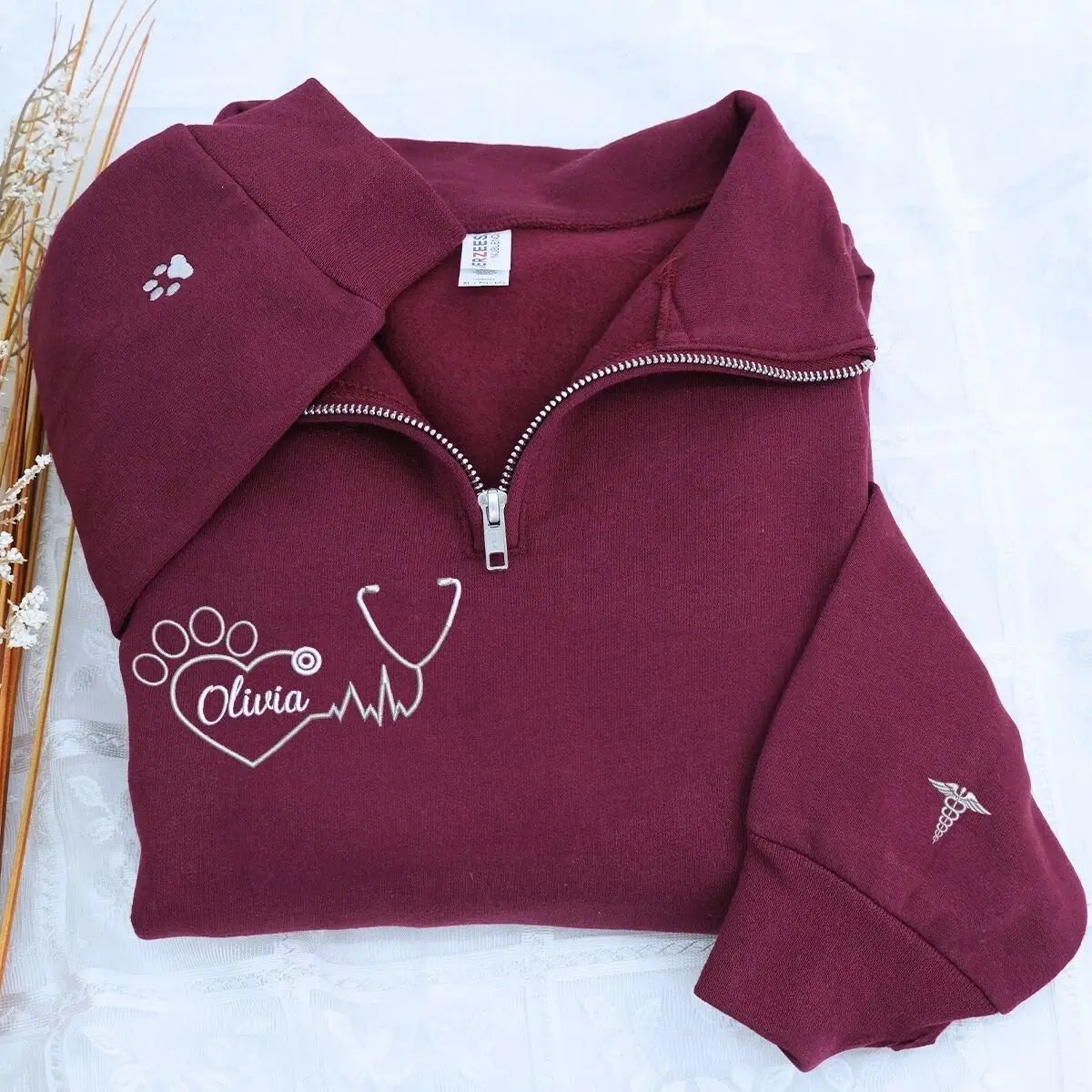 Embroidered veterinarian sweatshirt with custom name and sleeve text for vet nurses