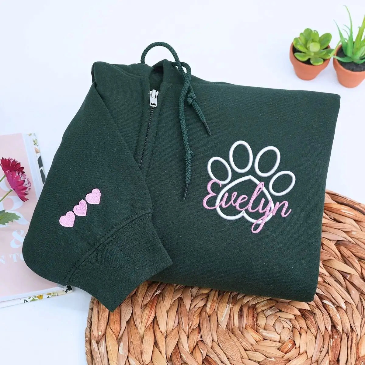 Custom embroidered veterinarian sweatshirt with paw print and name on chest