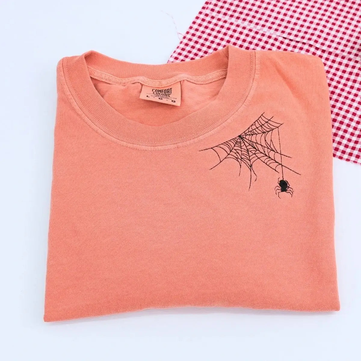 Embroidered bat Halloween t-shirt on neckline, Comfort Colors cotton in fall-inspired tones