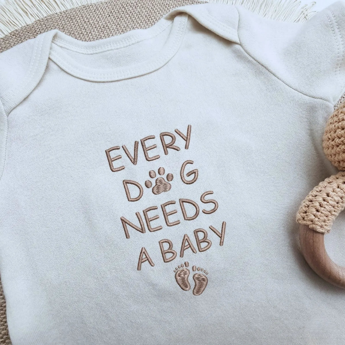 Embroidered Every Dog Needs a Baby Onesie – cute baby bodysuit for pregnancy announcement gift