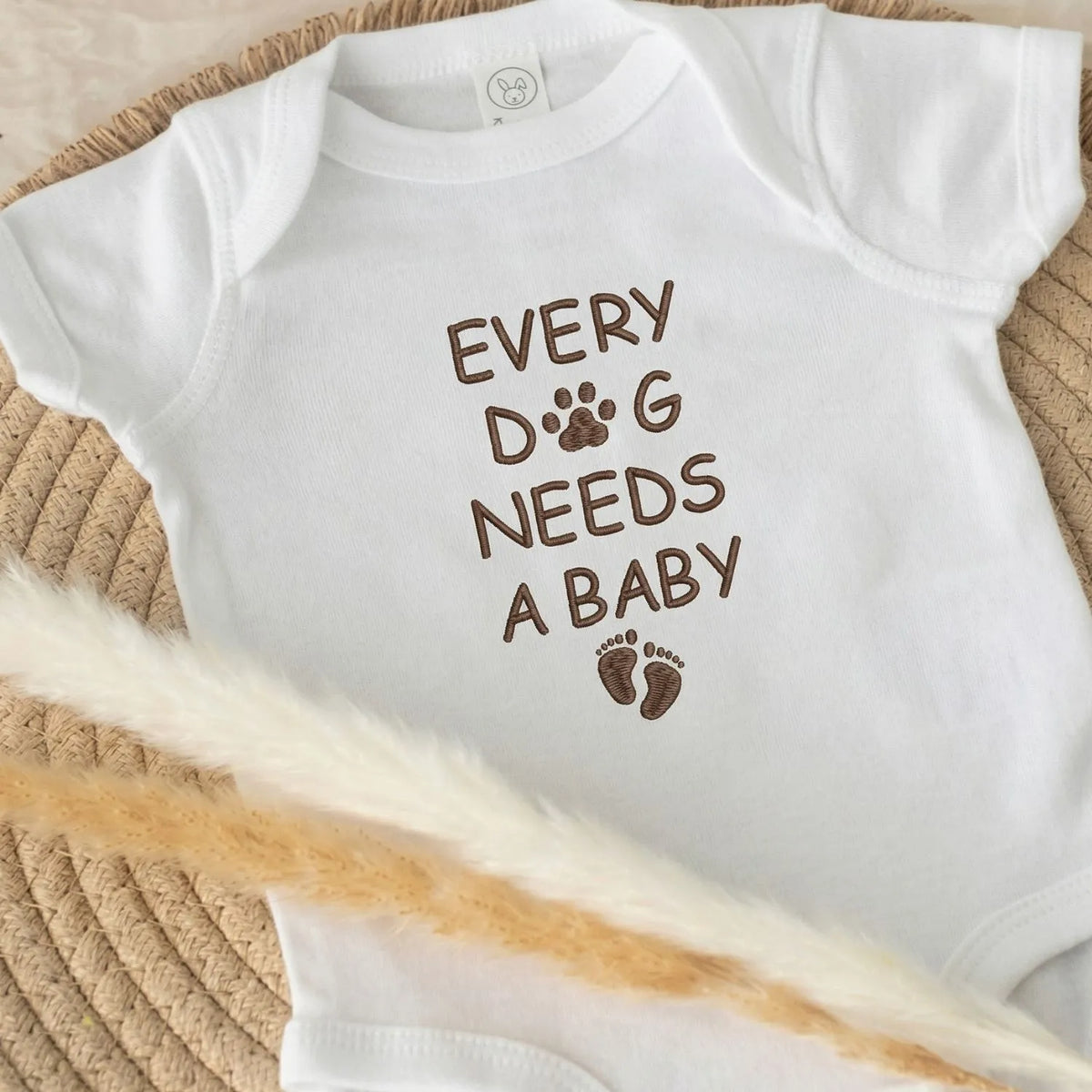 Embroidered Every Dog Needs a Baby Onesie – cute baby bodysuit for pregnancy announcement gift