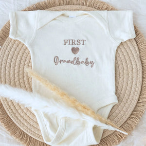 Soft embroidered newborn onesie announcing first grandbaby – perfect first-time grandparents gift
