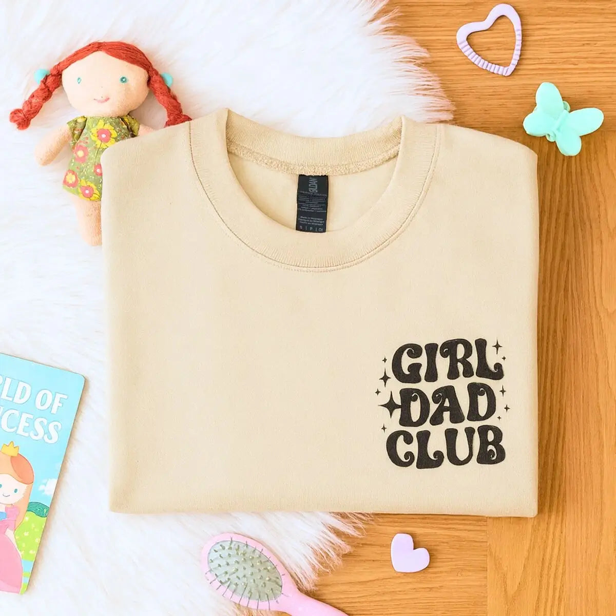 Man wearing Girl Dad shirt with embroidered daughter’s name on sleeve – personalized Father’s Day gift