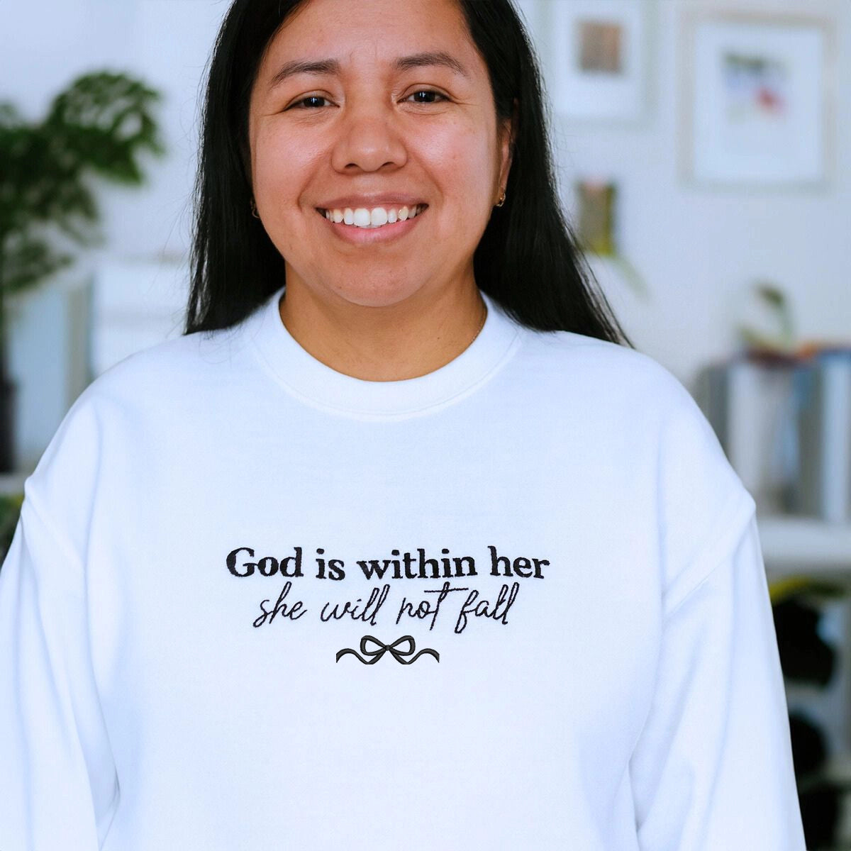 Embroidered “God Is Within Her” Christian sweatshirt with bow and floral cross, perfect for coquette Christian aesthetic.