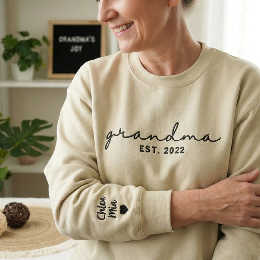 First Time Grandma Sweatshirt - Personalized Mother’s Day Gift with Embroidered Sweater Name on Sleeve