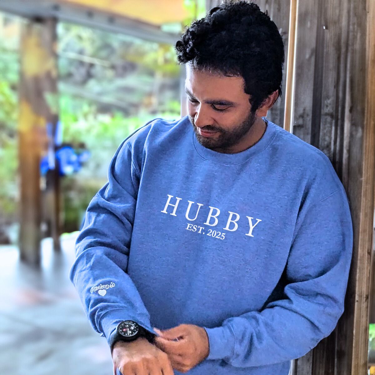 Blue 'Hubby EST. 2025' sweatshirt with personalized embroidery, a perfect anniversary or wedding gift for husbands.