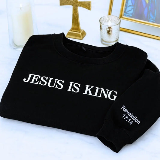 Custom embroidered Jesus Is King sweatshirt with personalized sleeve text 