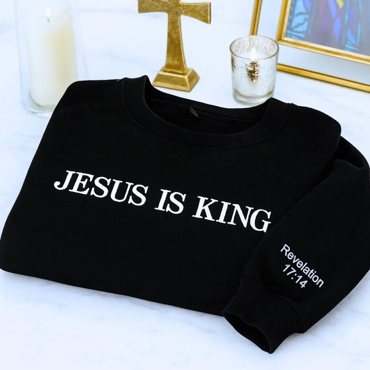 Custom embroidered Jesus Is King sweatshirt with personalized sleeve text 