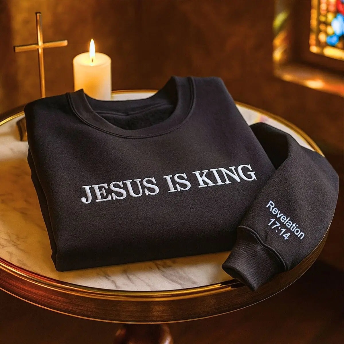 Custom embroidered Jesus Is King sweatshirt with personalized sleeve text