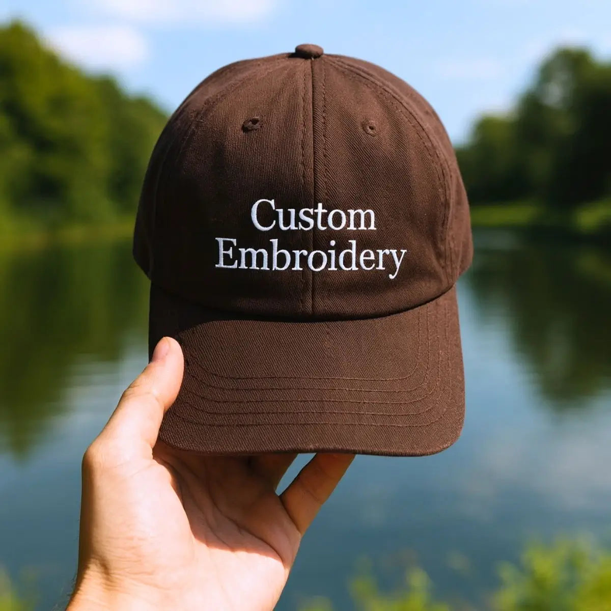 Custom embroidered hat with personalized white text on navy cap, adjustable fit