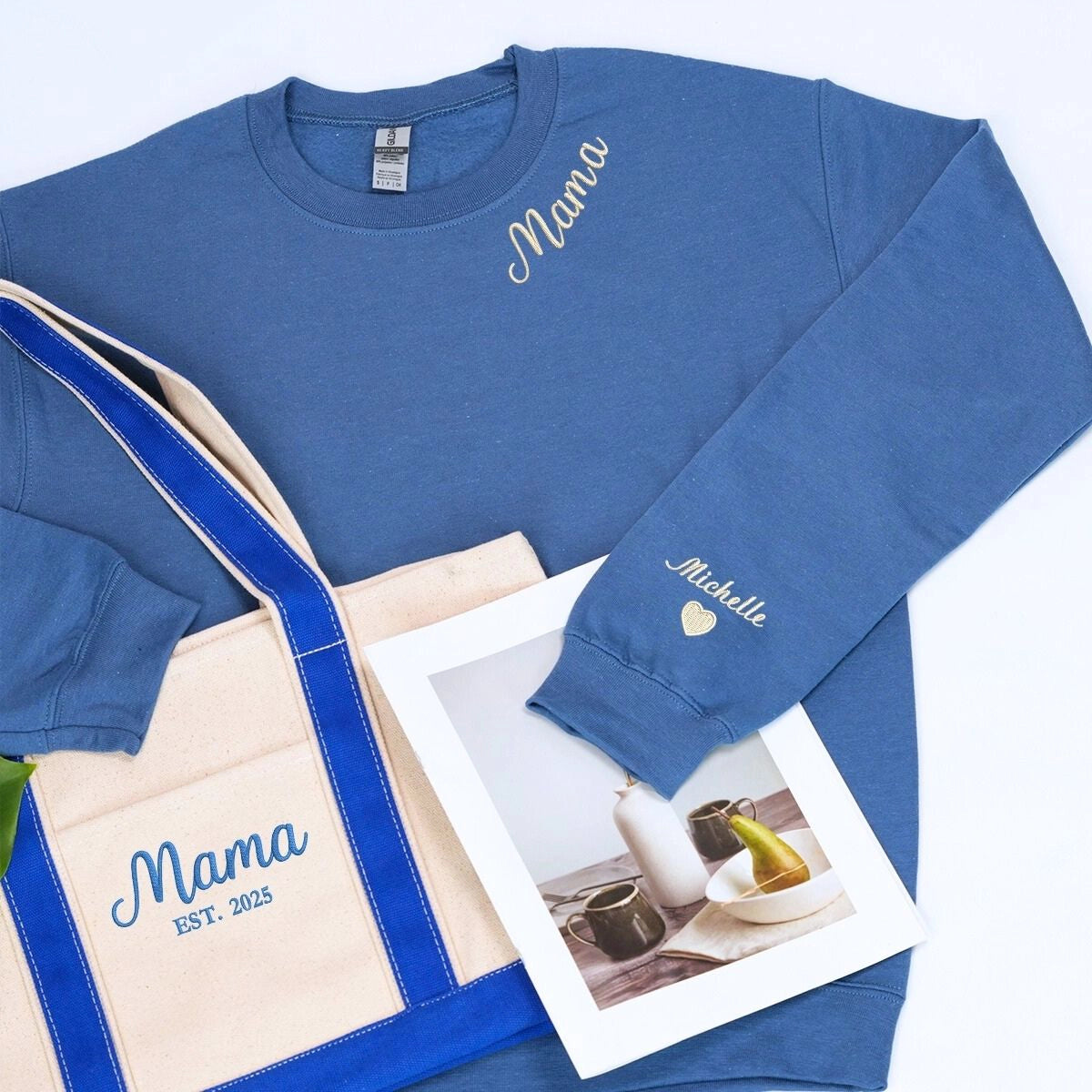 Embroidered mama sweatshirt and matching tote bag gift set on neutral background