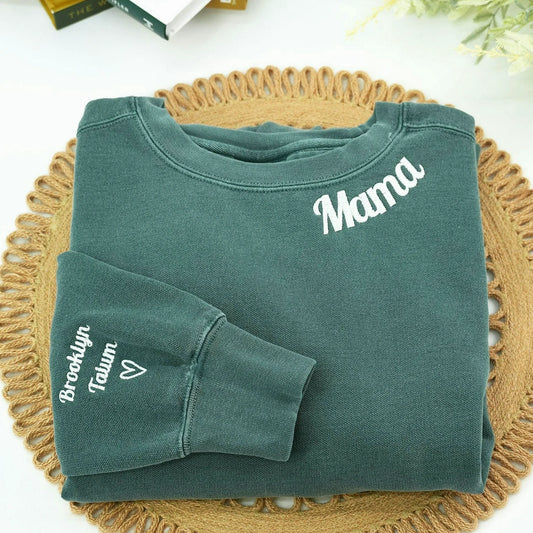 custom embroidered blue spruce Mama sweatshirt with kid name detail on the sleeve, made for new moms, wives, Mother’s Day, birthdays, and everyday memories.
