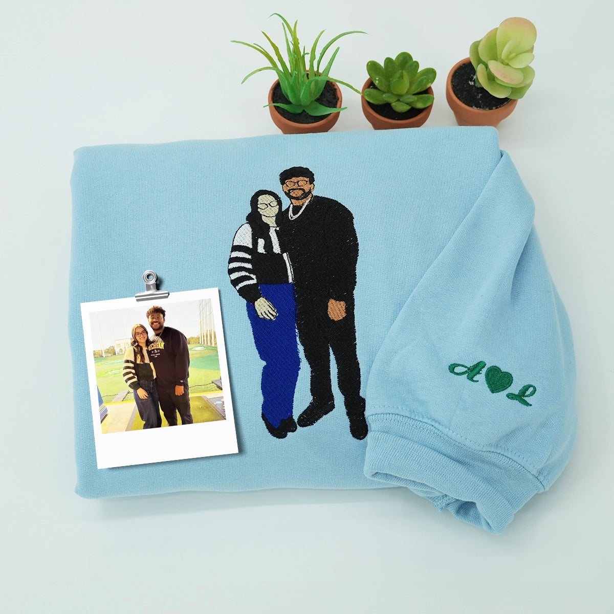 Couple wearing matching embroidered sweatshirts with hat and tote bag – romantic gift set