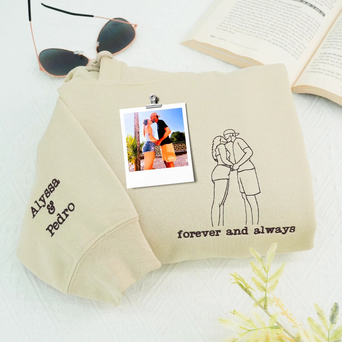 Couple wearing matching embroidered sweatshirts with hat and tote bag – romantic gift set