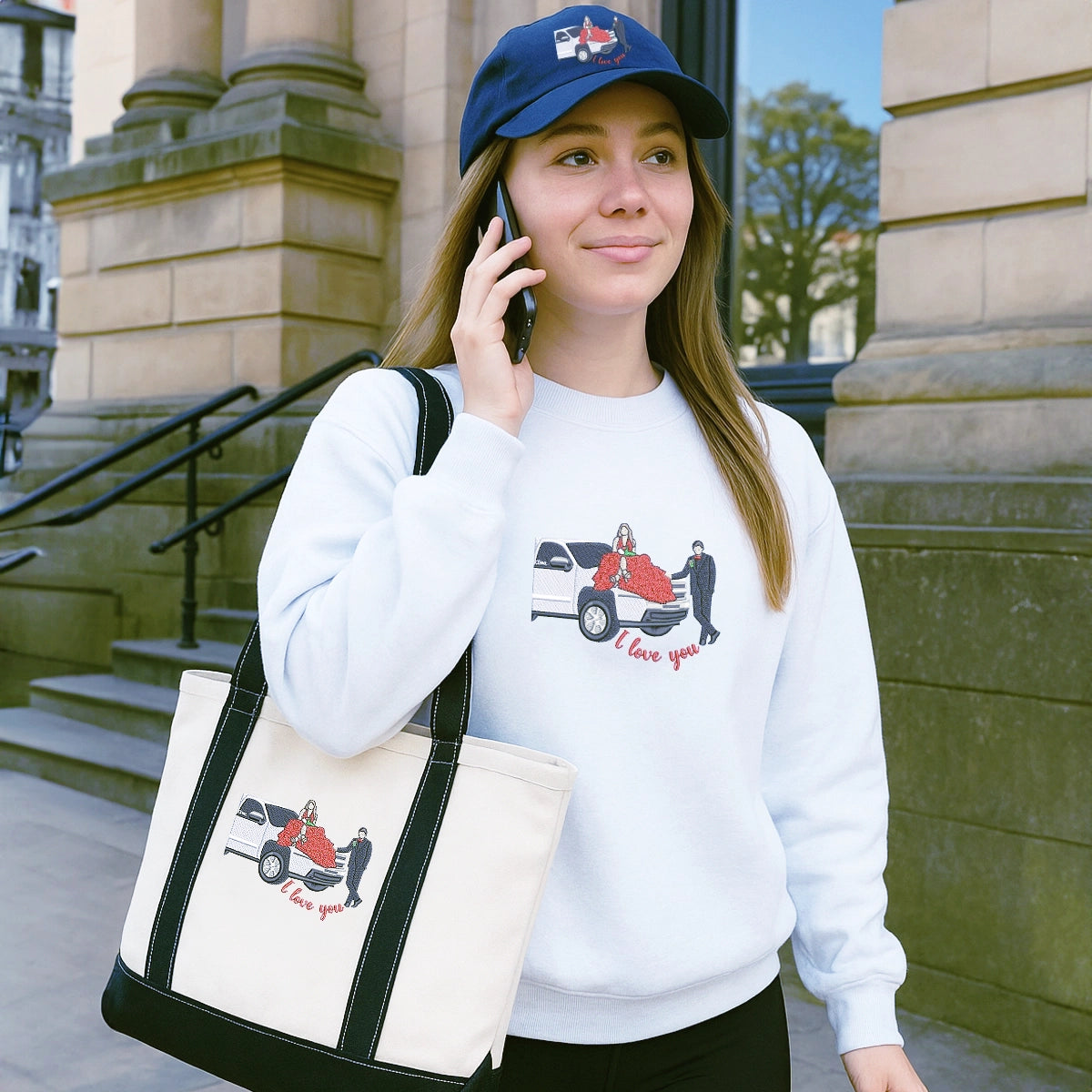 Couple wearing matching embroidered sweatshirts with hat and tote bag – romantic gift set
