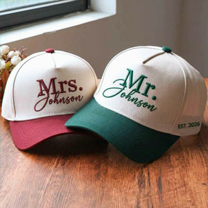 Custom embroidered Mr. and Mrs. Johnson couple baseball hats for wedding gift, featuring "EST. 2026".