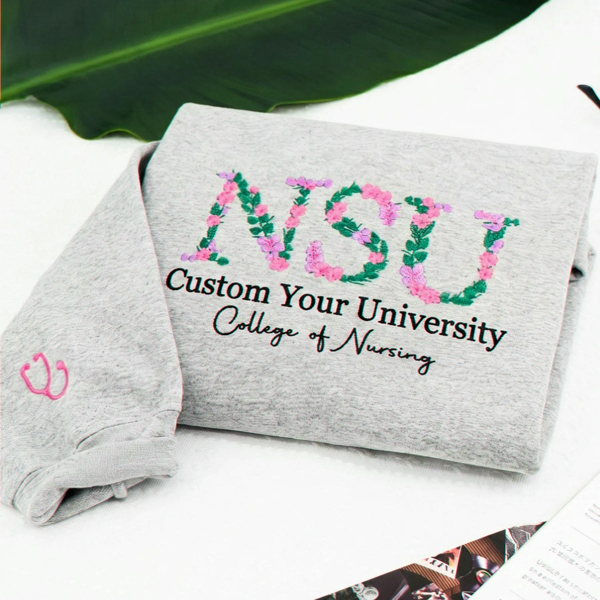 Custom sport gray floral sweatshirt personalized with university and College of Nursing wording