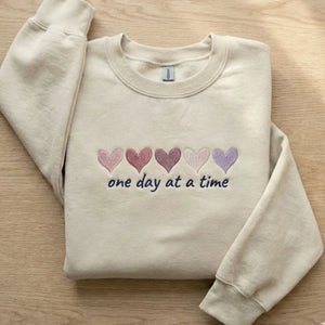 Mini Hearts Crewneck - Embroidered Valentine's Sweatshirt with One Day At a Time Message