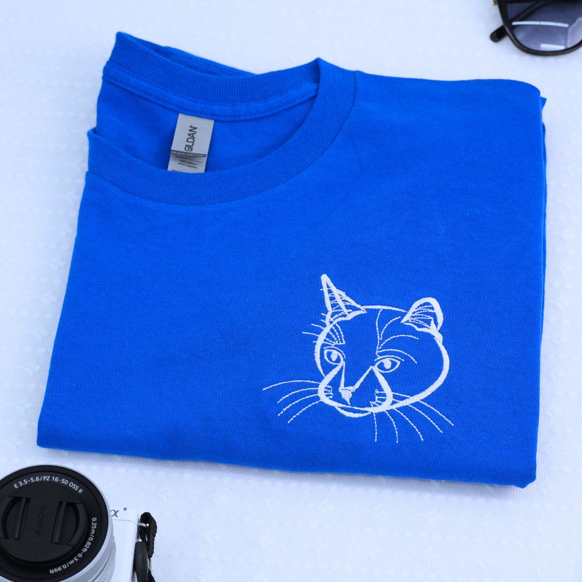 Embroidered custom cat dad shirt featuring personalized portrait of cat on fabric