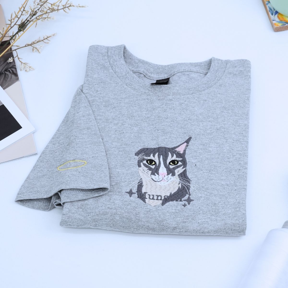 Embroidered custom cat dad shirt featuring personalized portrait of cat on fabric