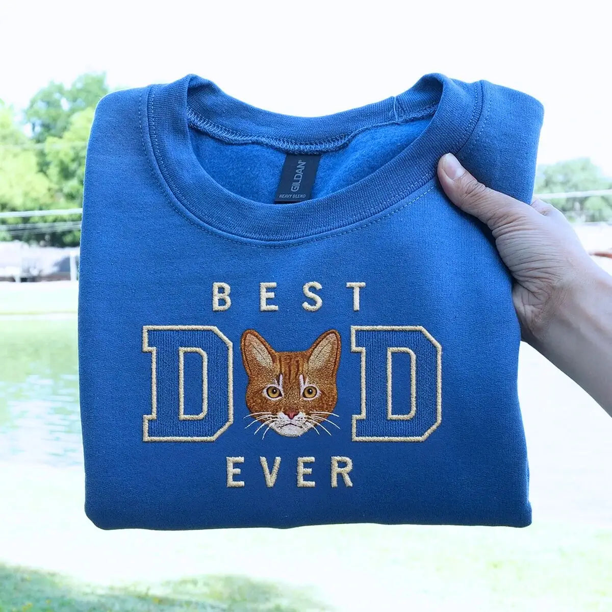 Embroidered custom cat dad shirt featuring personalized portrait of cat on fabric