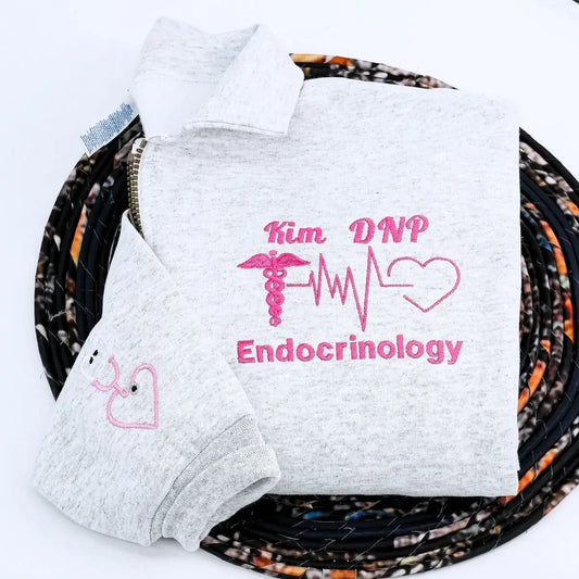 Custom embroidered quarter zip sweatshirt with nurse’s name, perfect gift for healthcare workers